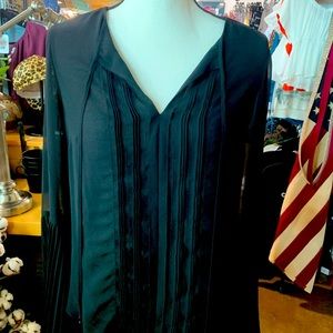 Black flare sleeve blouse.